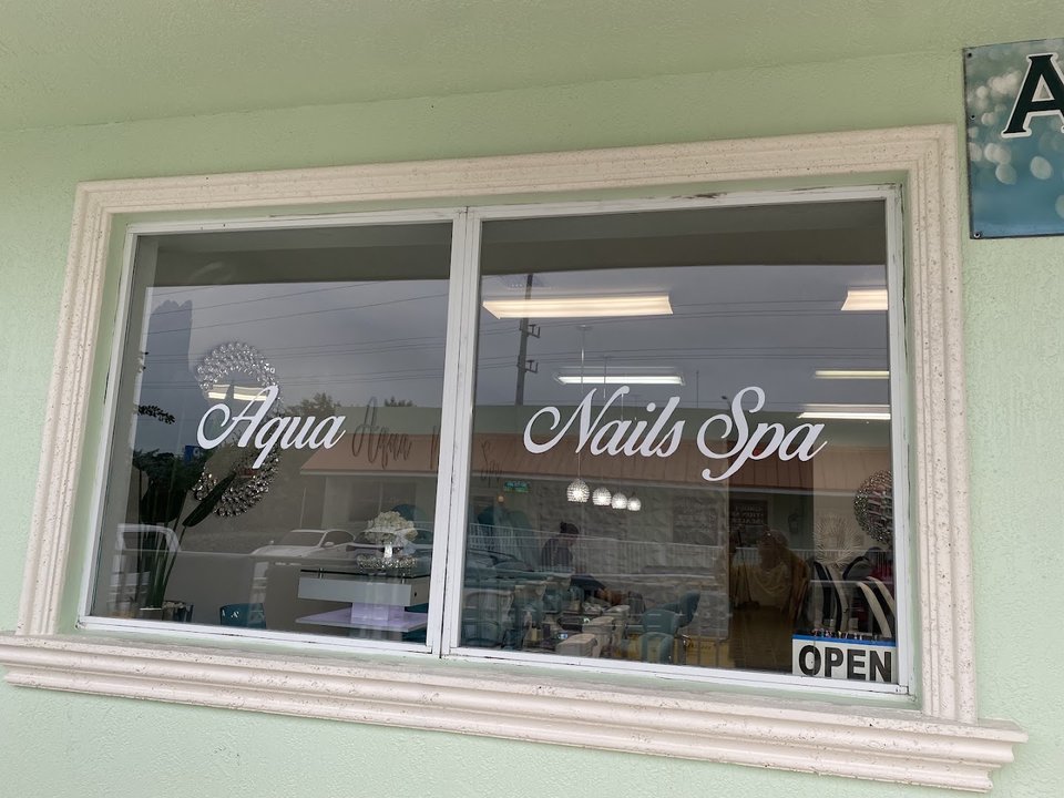 Bright salon interior with manicure tools and chairs.